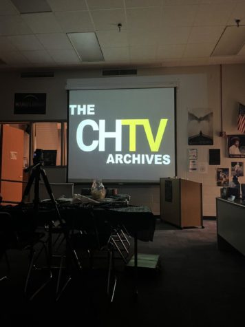 A projector screen with the CHTV opening logo on it