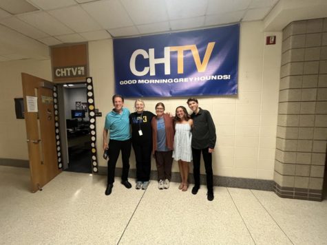 Hal Espey, Terri Ramos, Brandy Ostojic, Elyse Timpe and Jack Ringenberg standing together under a CHTV banner