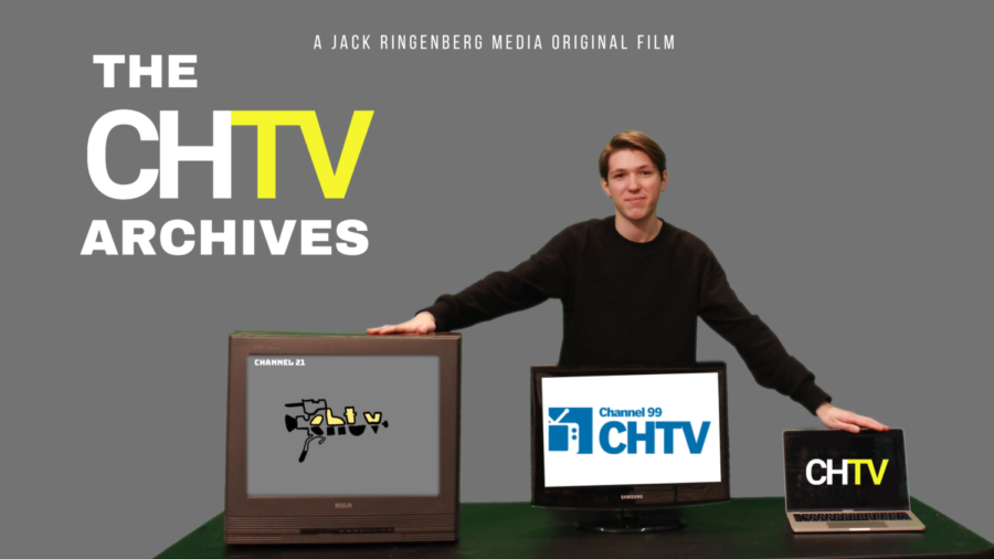 Jack standing in front of 2 TVs and a MacBook. An old one with the original CHTV logo, a mid 2000s
