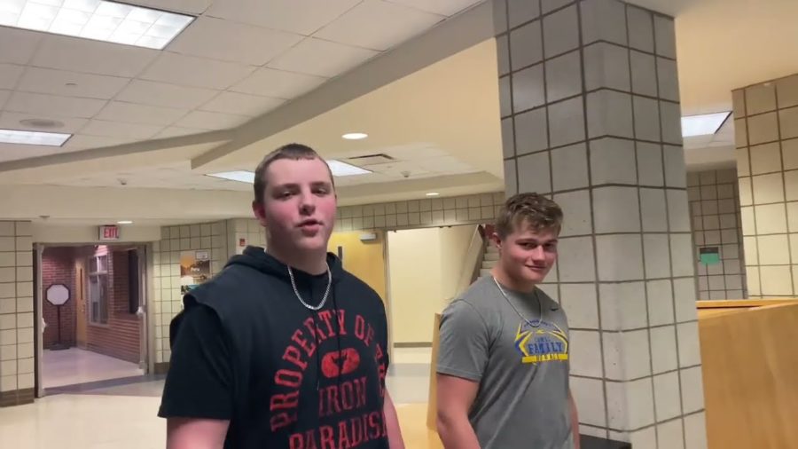 Michael and Cade walking in the hallways of the Freshman Center at Carmel High School