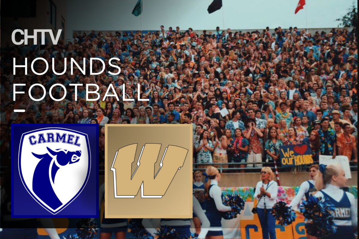 The Carmel High School student section. In the top left of the screen is the CHTV logo. Under the logo is the text, Hounds Football. Under the text is the Carmel logo and the Warren Central logo