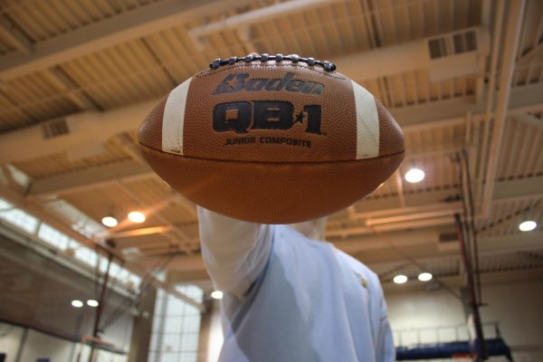 A person holding a football