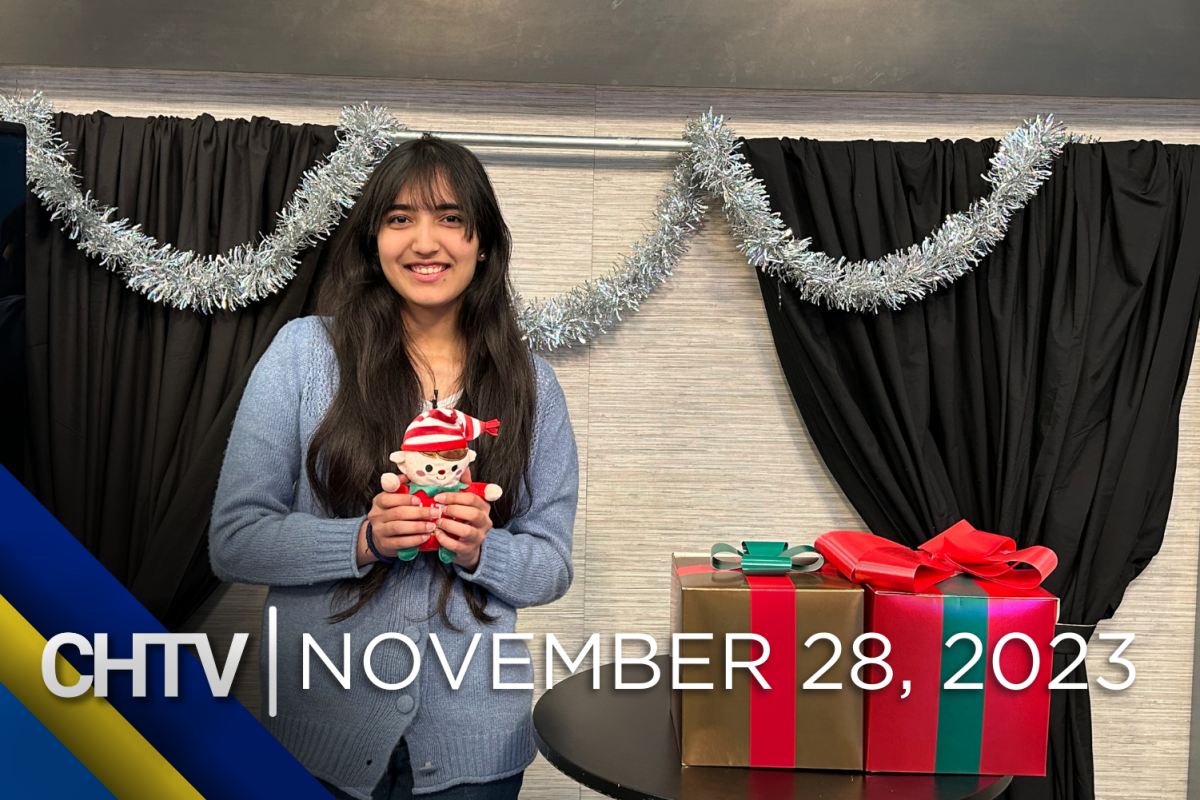 Zaynab standing at the entertainment set, decked out for the holidays, with the text CHTV: November 28, 2023 in front of her