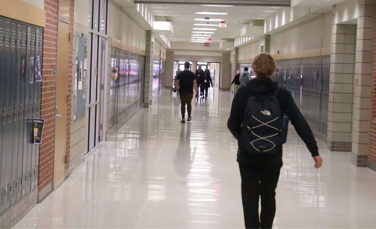 A student walking in the hallway