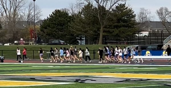 Students running on a track