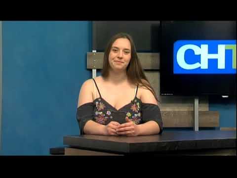 Brigette Beck sitting at the CHTV news desk