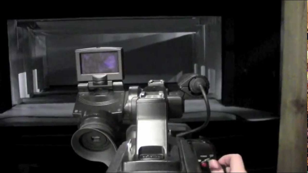 A camera pointed at the auditorium stage