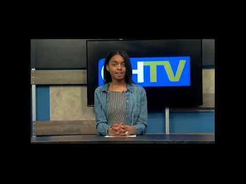 Cami Petit sitting at the CHTV news desk